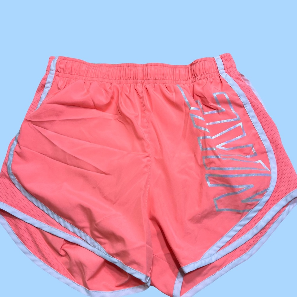 Neon Nike athletic running shorts